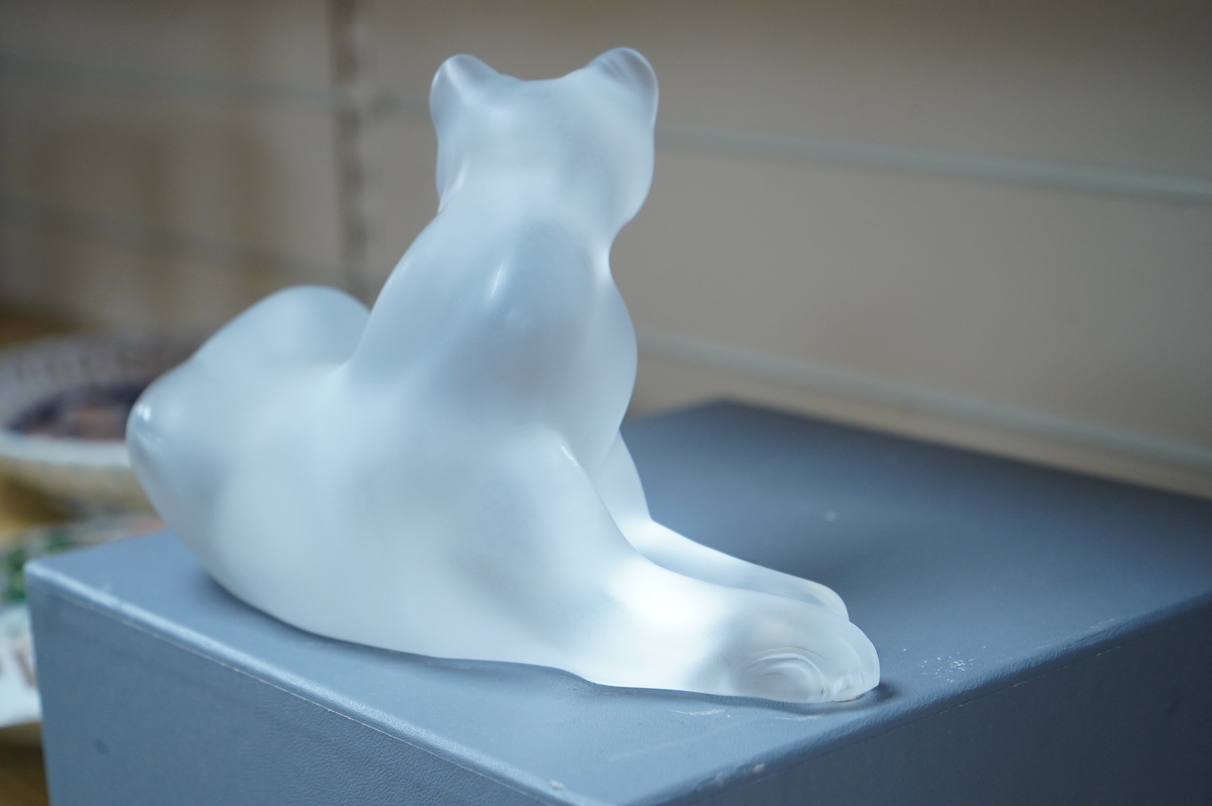 A Lalique glass figure, ‘Simba Lioness’, signed to the base, boxed, 24cm wide